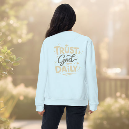Female model wearing Christian sweatshirt Trust God Daily